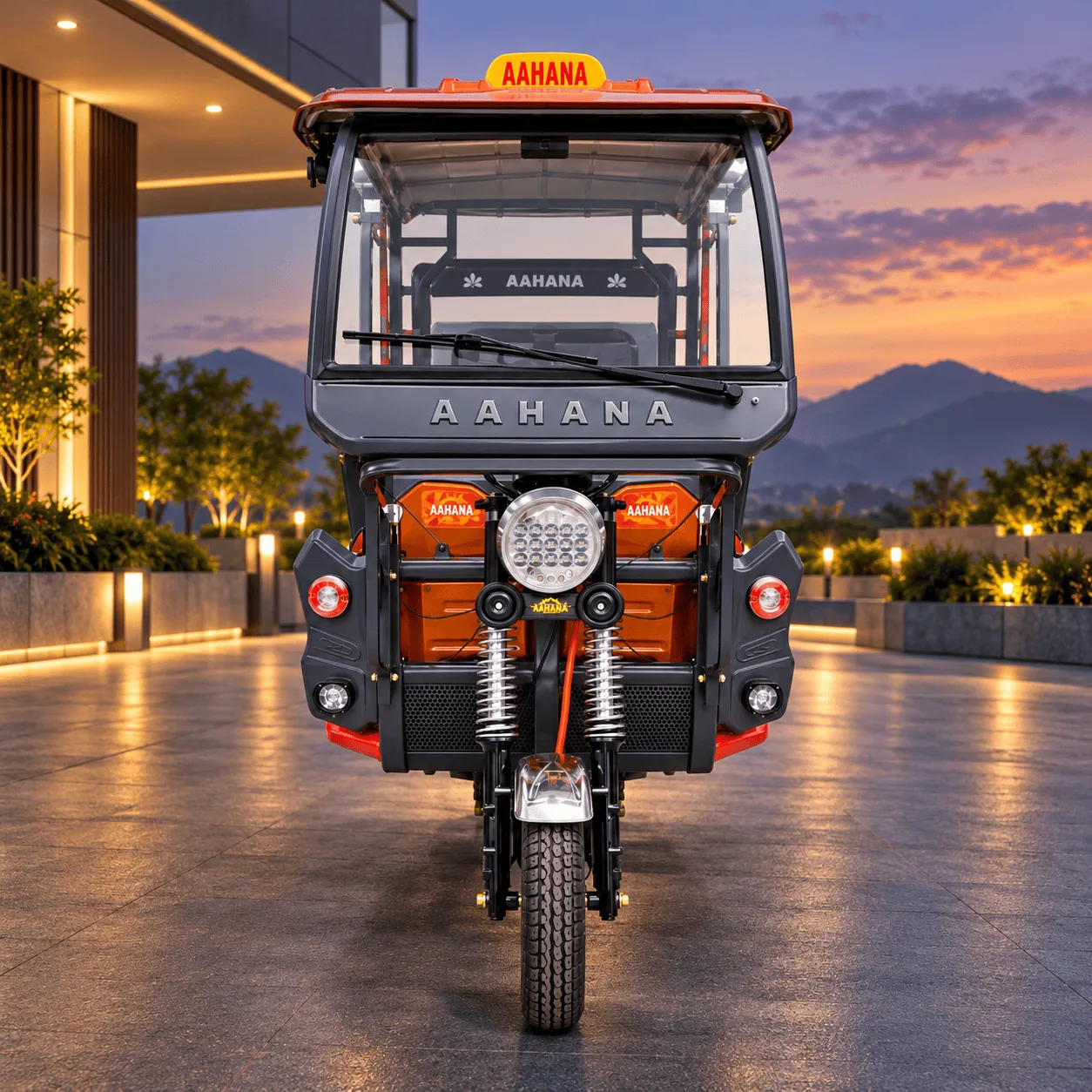Aahana Titan electric rickshaw - orange - front view